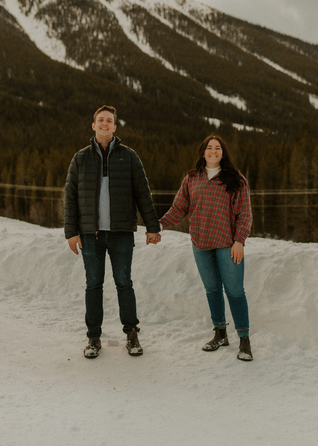 Couple holding hands at Spray Lakes, Alberta